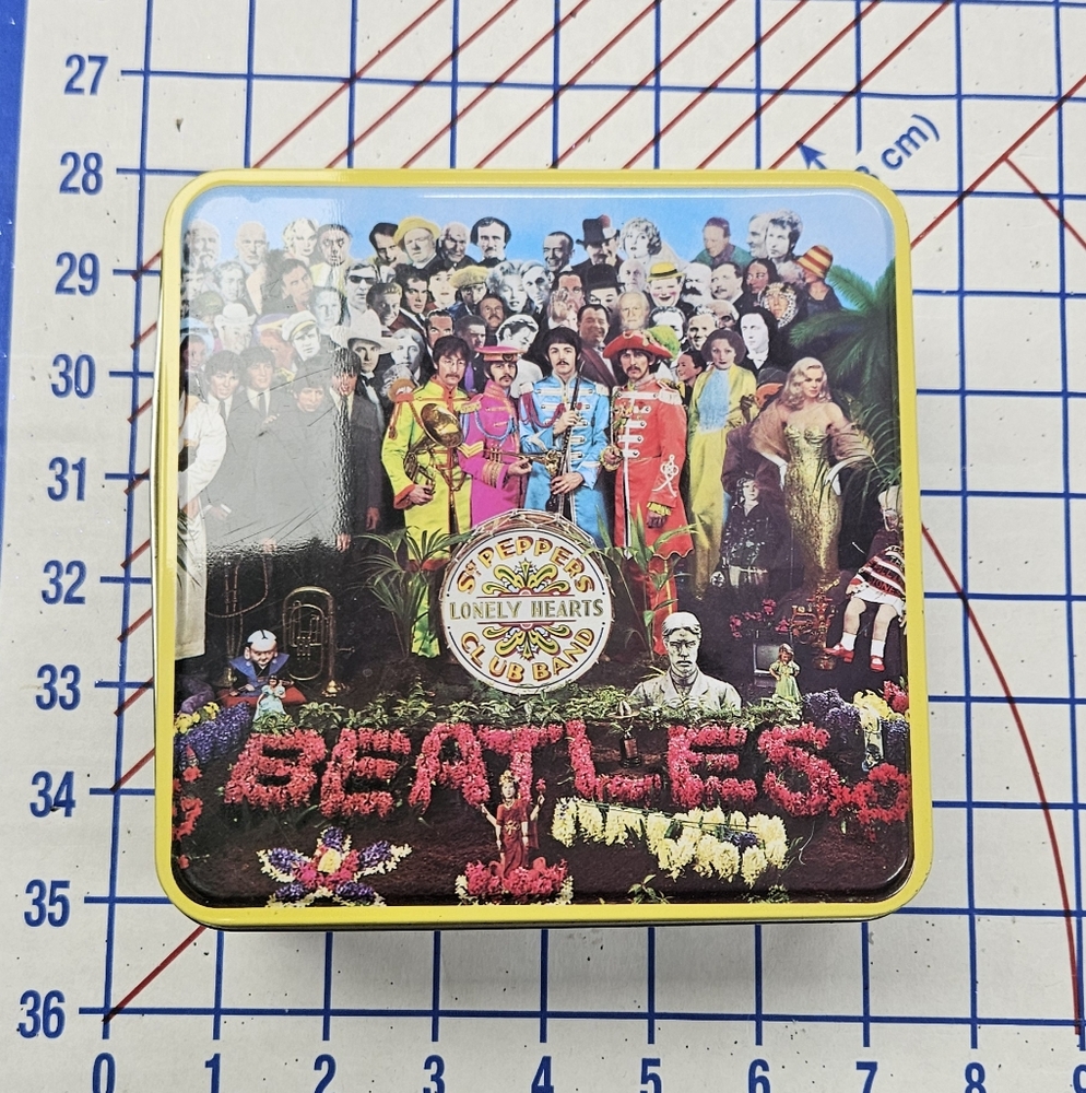 A set of 5 Beatles double-sided puzzles